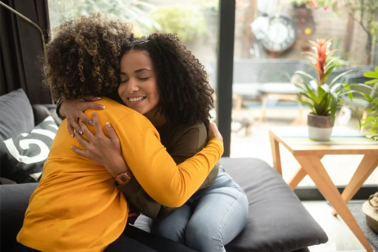 Two woman hugging, counselling in Leicestershire